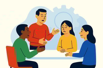 A diverse team sits around a table in a tense but constructive conversation, symbolizing conflict being used as a growth tool rather than a problem.
