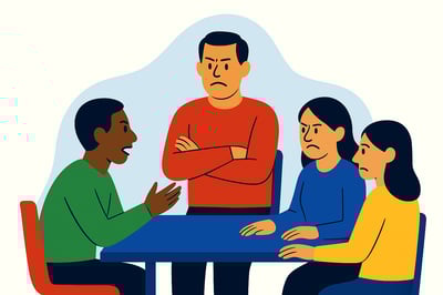 A diverse group of coworkers sit around a table as tension rises, showing frustrated, defensive, and withdrawn body language while conflict builds in the room.